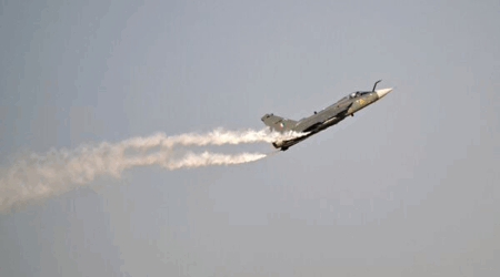 IAF HAL Tejas Mk 1 performing an aerial display flight at Al Maktoum International Airport during the Dubai Airshow 2025